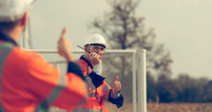 engineer working at a wind farm for renewable energy
