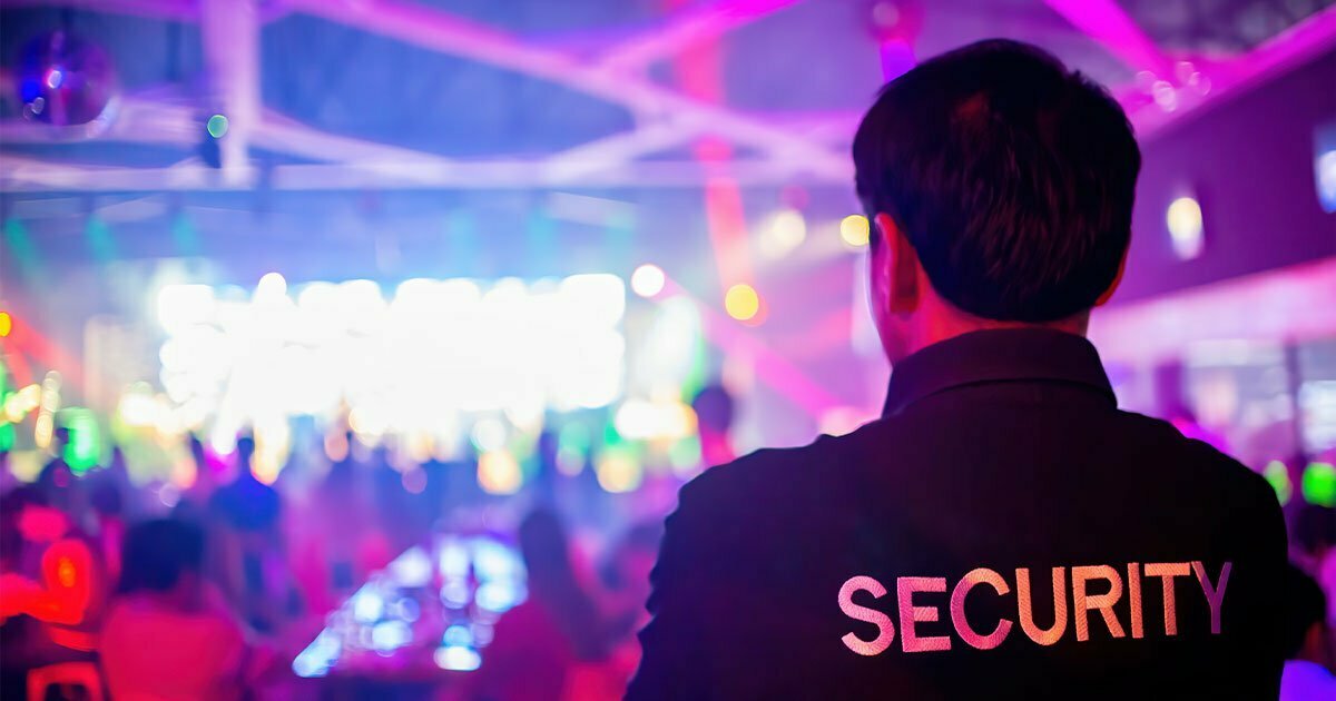 security guard are regulating the situation of safety in an event concert in a nightclub